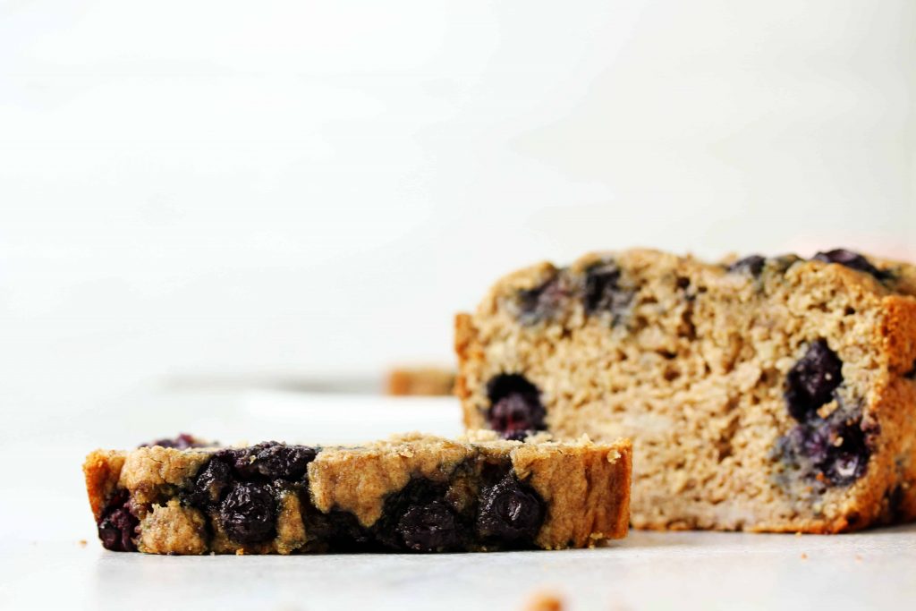 This healthy blueberry banana bread is a toast lover’s dream! You can make it gluten free or with whole wheat flour. Toast it up and spread it with your fave nut butter and jelly for the perfect quick and healthy snack! #glutenfree #lowfodmap #blueberry #bananabread