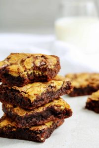 If you can't decide between having a brownie or a chocolate chip cookie just combine them into one! This healthy, high protein "brookies" recipe is low carb, vegan, gluten free, and insanely delicious! They even make a great post workout snack - you're going to want to bake these ASAP!